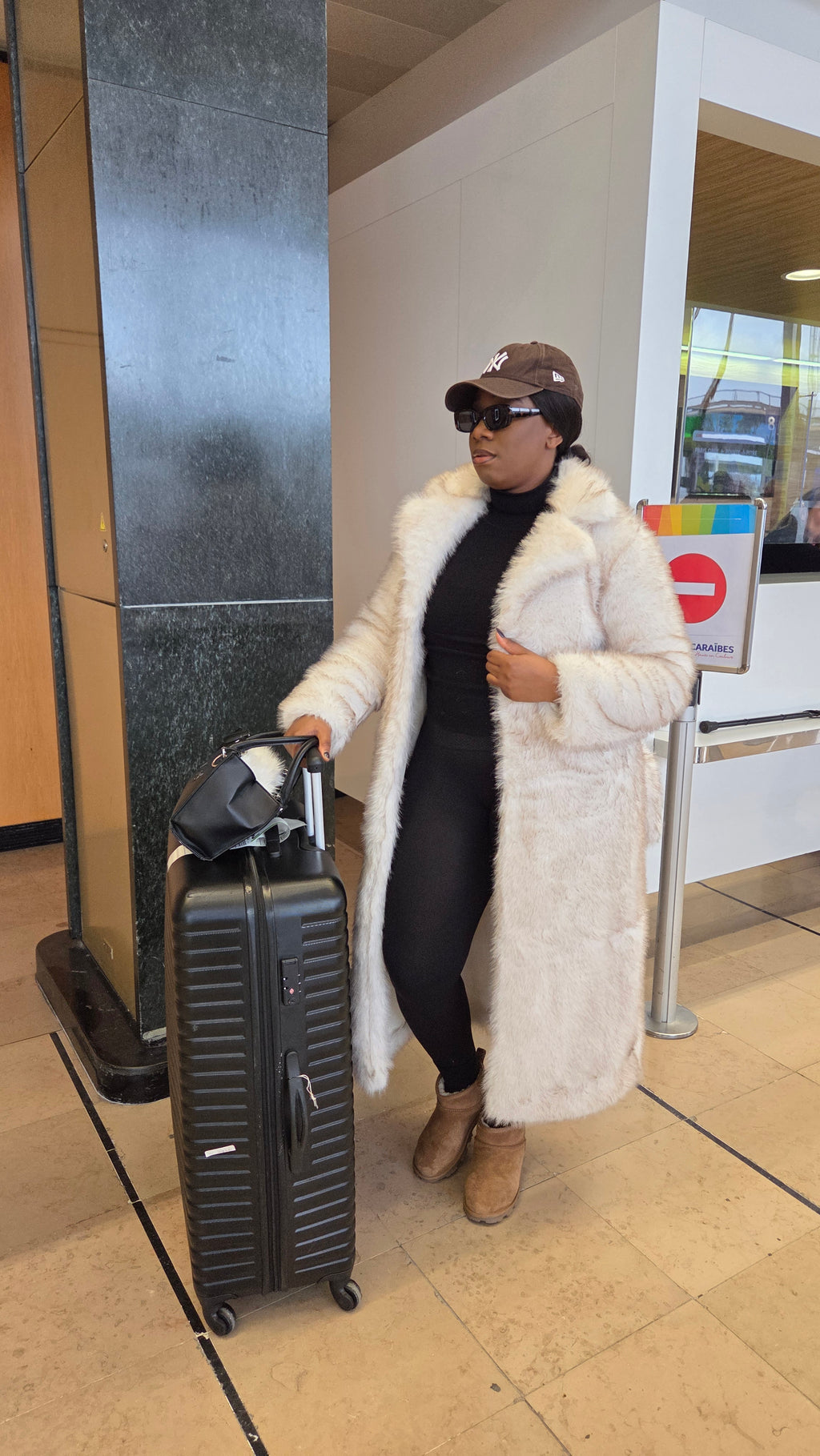 Manteau en fourrure crème