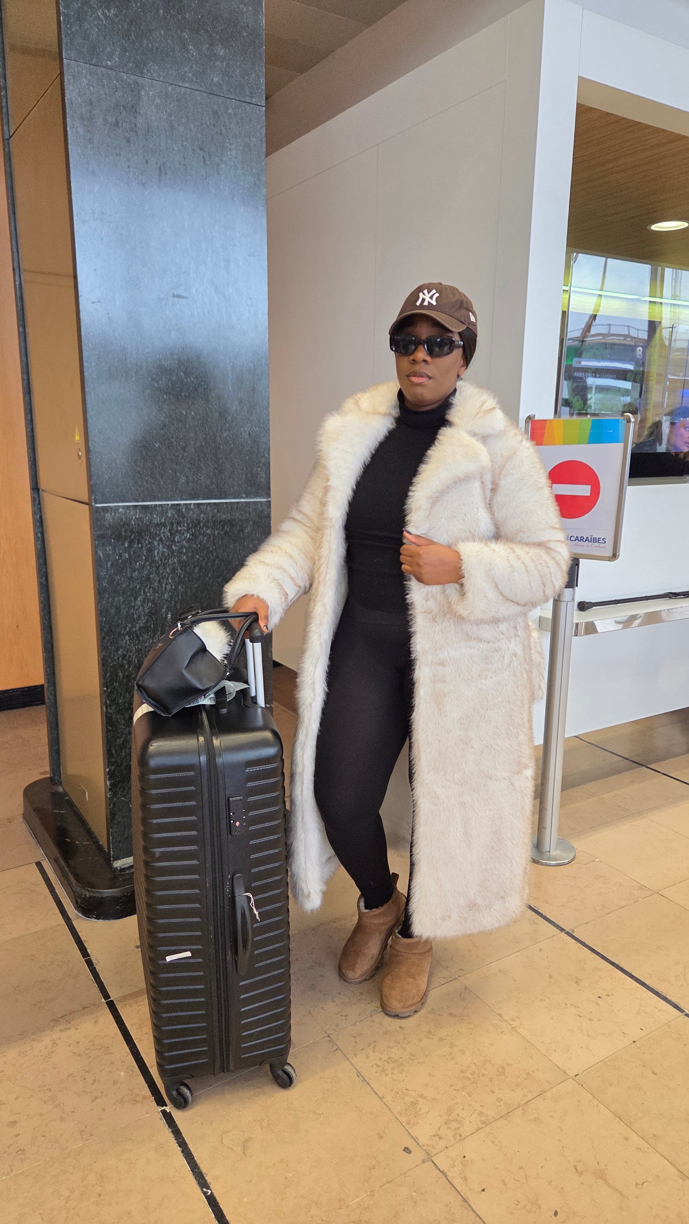 Manteau en fourrure crème